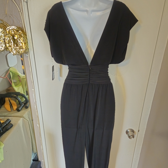 New..Guess jumpsuit, size small..black color..for small waist girls. - Picture 3 of 6